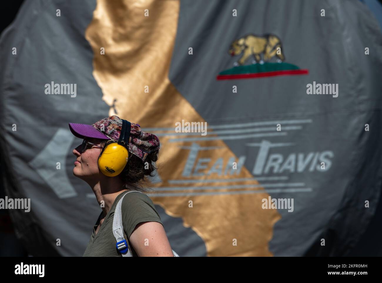 a-member-of-the-public-stands-in-front-of-a-kc-10-extender-engine