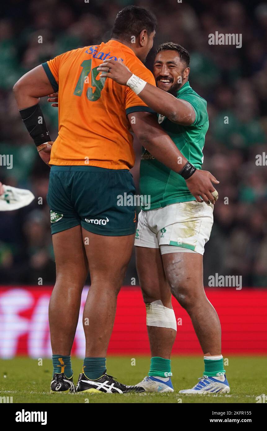 Ireland s Bundee Aki right embraces Australia s Will Skelton