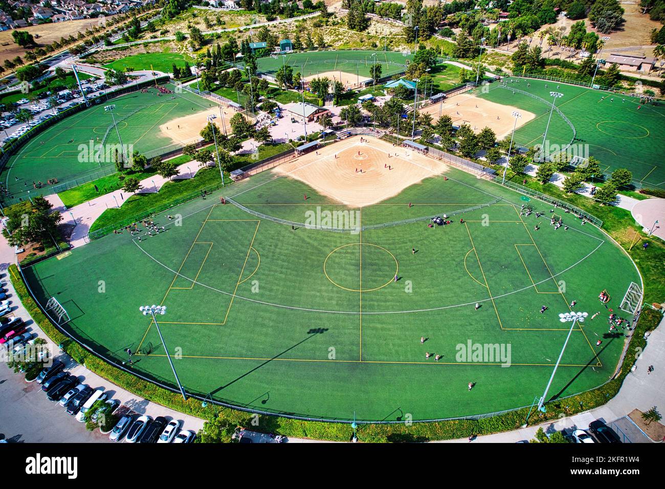 A drone view of a multi-use playfield with baseball and softball diamonds Stock Photo