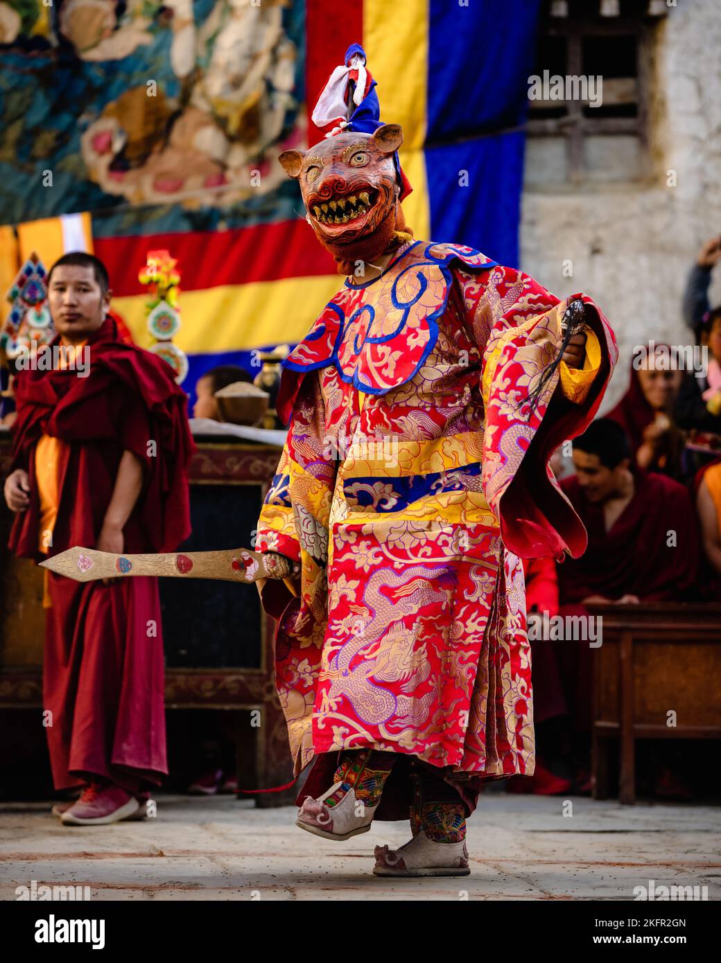 A monk in demon ghost outfit and mask performing Dance at the Tiji ...