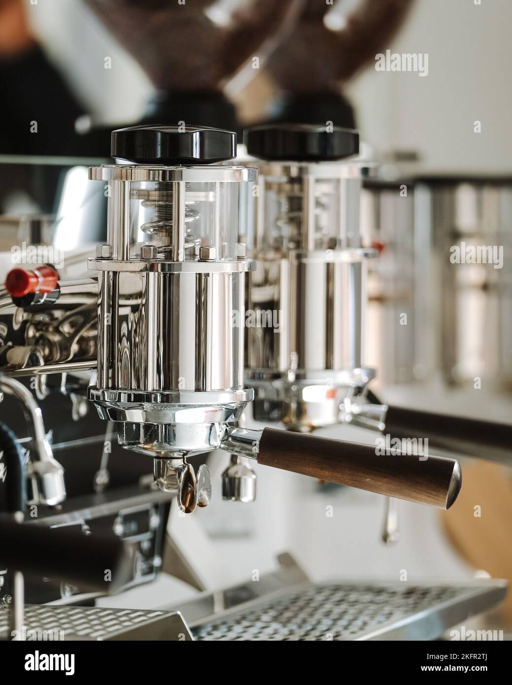 A selective focus shot of professional coffee machines Stock Photo