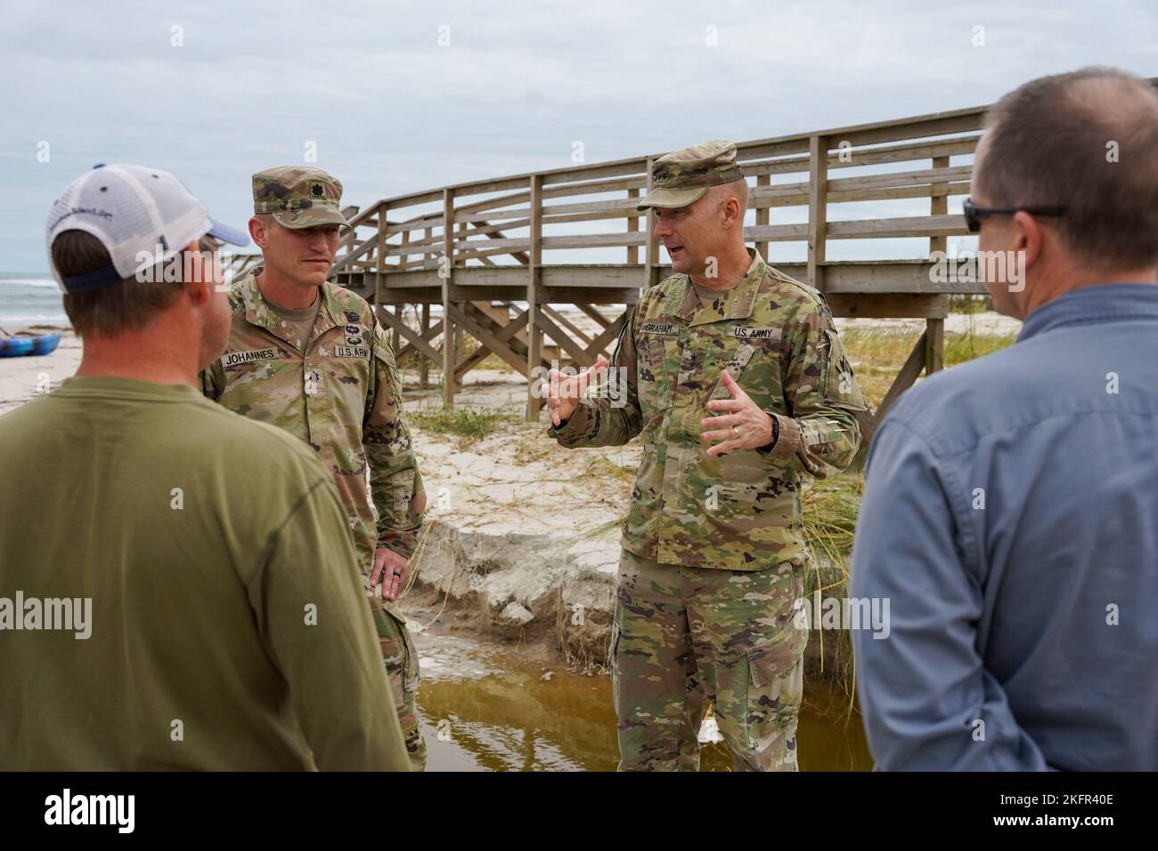 PAWLEYS ISLAND, S.C. (Oct. 02, 2022) Major General William Graham, U.S. Army Corps of Engineers, Headquarters deputy commanding general, and Lt. Col. Andrew Johannes, U.S. Army Corps of Engineers, Charleston District commander, met with local elected leaders at North Myrtle Beach, Myrtle Beach, and Pawleys Island Oct. 2 to survey damage left behind from Hurricane Ian. The U.S. Army Corps of Engineers is working with local, state, and federal partners to conduct post-storm surveys and preliminary damage assessments along the Grand Strand. Stock Photo