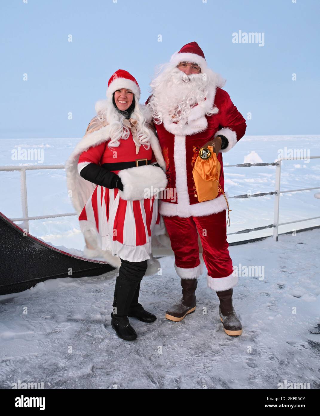 Santa and Mrs. Claus visit the USCGC Healy (WAGB 20) at the North Pole, Oct. 2, 2022. U.S. Coast Guard photo by Deborah Heldt Cordone, Auxiliary Public Affairs Specialist 1. Stock Photo