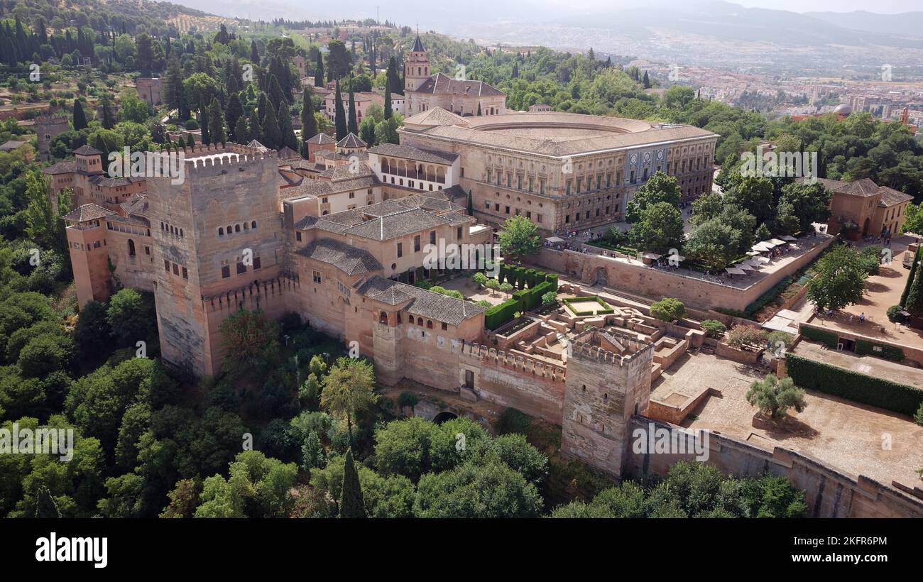 Aerial drone view of the Alhambra Palace, Granada during sunny day. Moorish Architecture. Unesco World Heritage Spain. Travel in time. Stock Photo