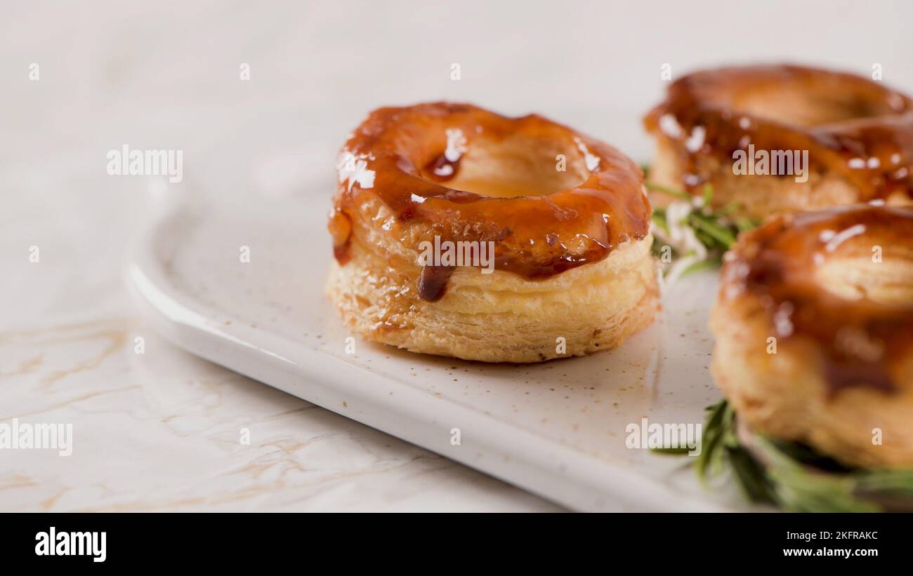 Typical Portuguese pastry Glorias, tender puff pastry topped with