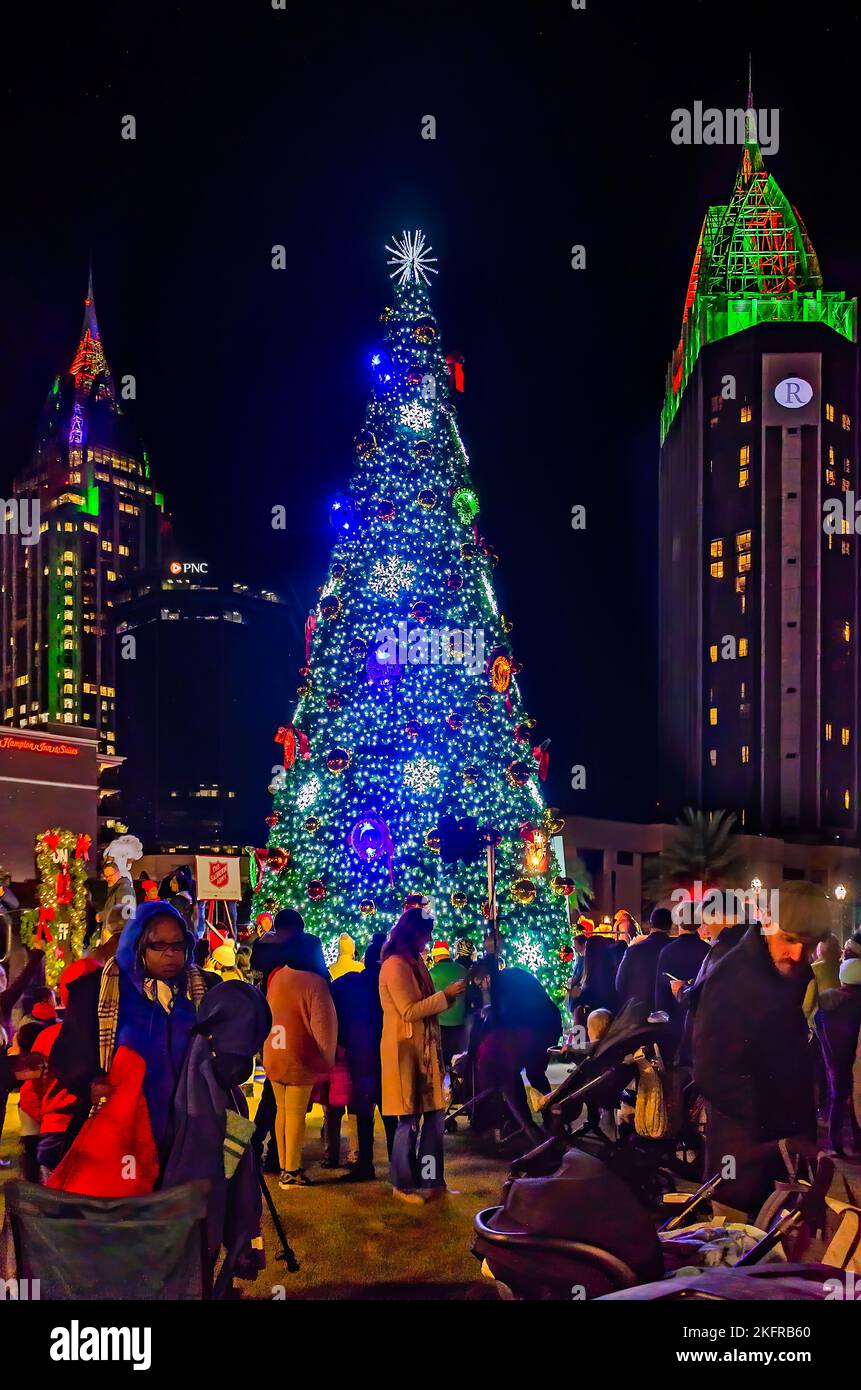 People gather for the lighting of the city Christmas tree at Mardi Gras Park, Nov. 18, 2022, in Mobile, Alabama. Stock Photo