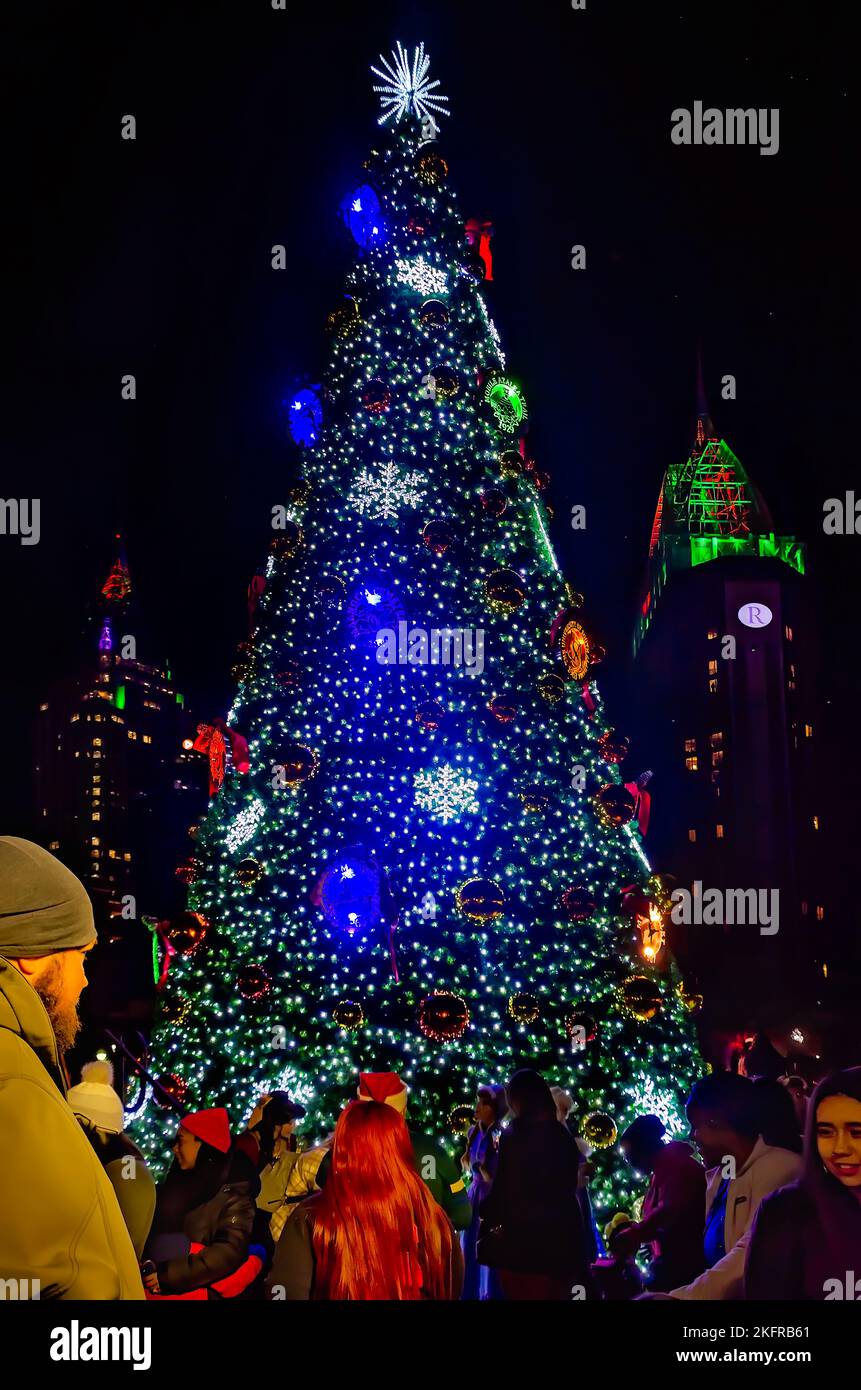 People gather for the lighting of the city Christmas tree at Mardi Gras Park, Nov. 18, 2022, in Mobile, Alabama. Stock Photo