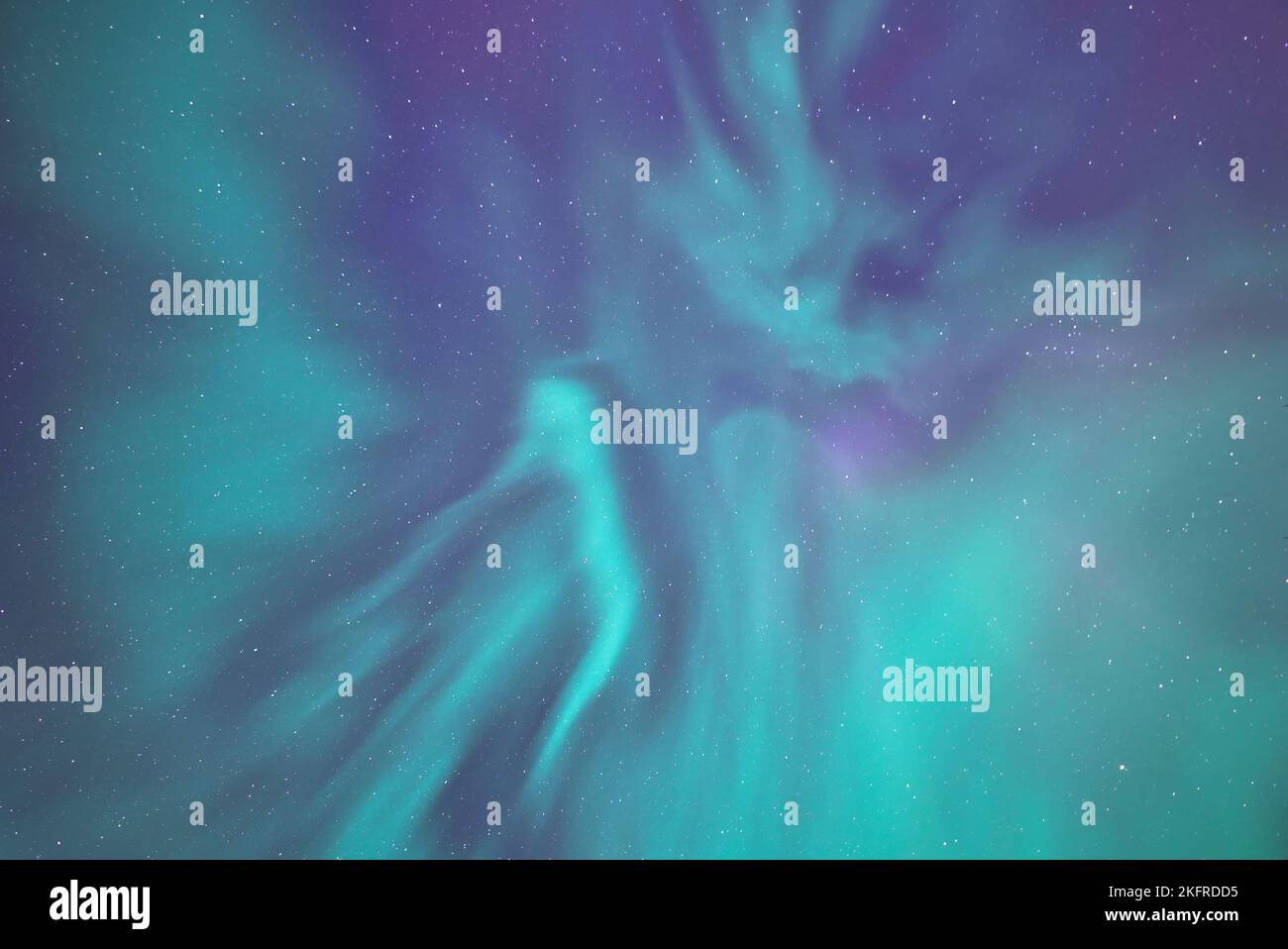 Aurora borealis Northern Lights overhead in Alaska with stars Stock