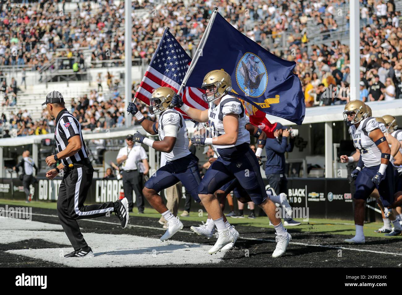 November 19, 2022: The Navy Midshipmen take the field during the University of Central Florida Knights and the Navy Midshipmen NCAA football game at FBC Mortgage Stadium in Orlando, FL on November 19, 2022. (Credit Image: © Cory Knowlton/ZUMA Press Wire) Stock Photo