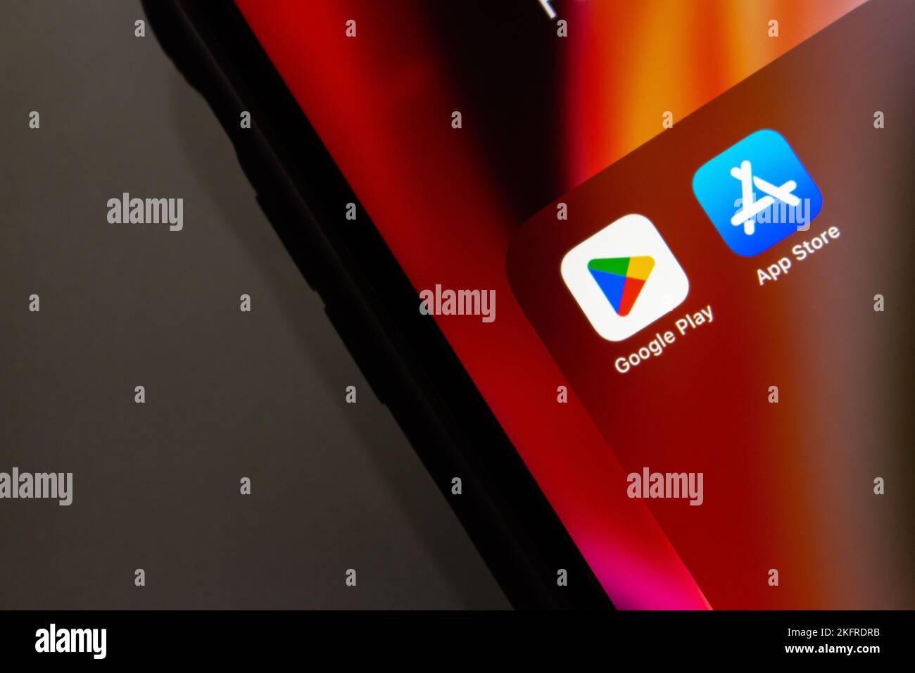 Vancouver, CANADA - Nov 19 2022 : Google Play Store and App Store icons on a smartphone screen. Stock Photo