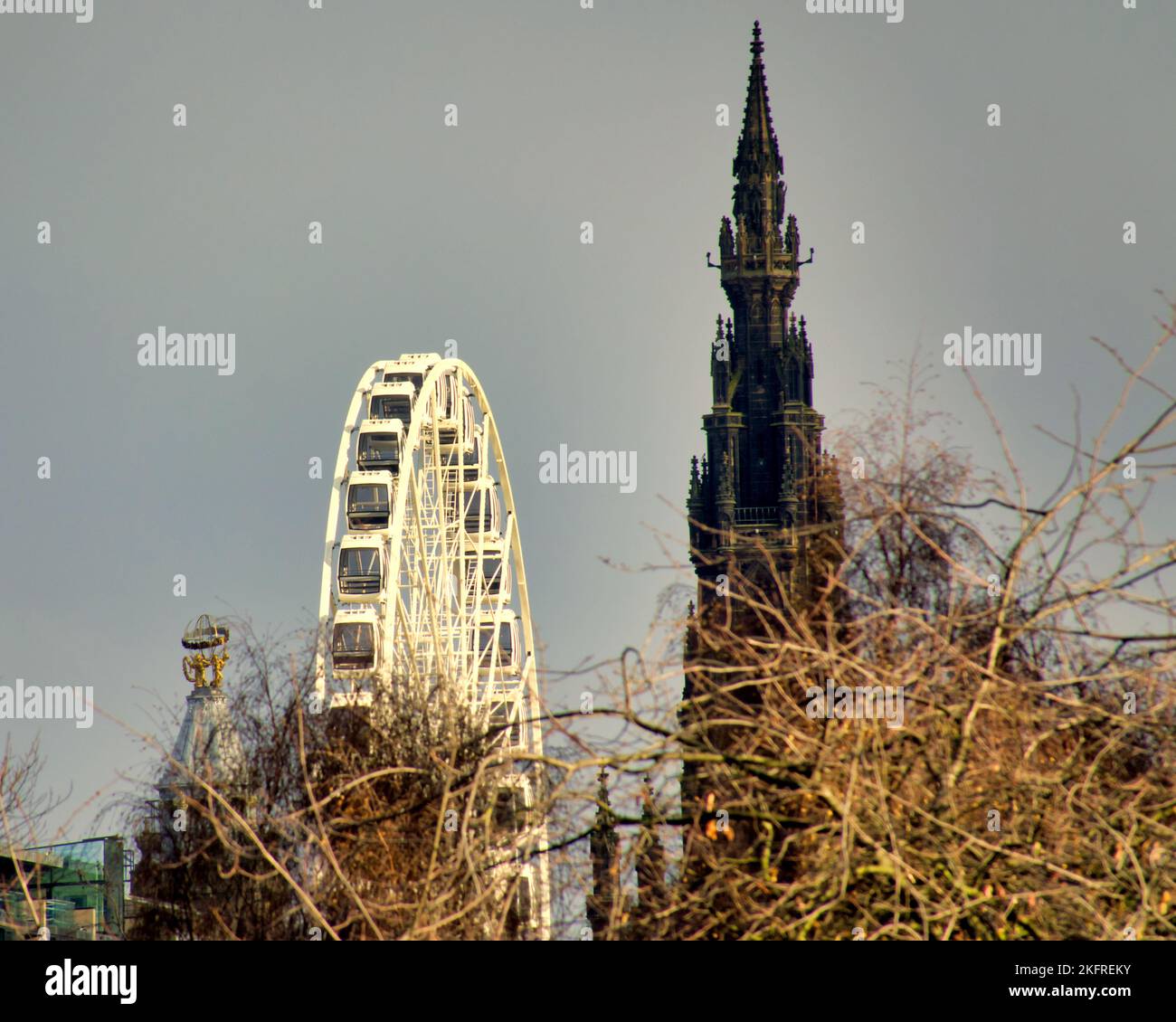 Aerial skyline view featuring the spire of st Cuthbert's church and the  Forth 1 Big Wheel on princes street gardens Stock Photo