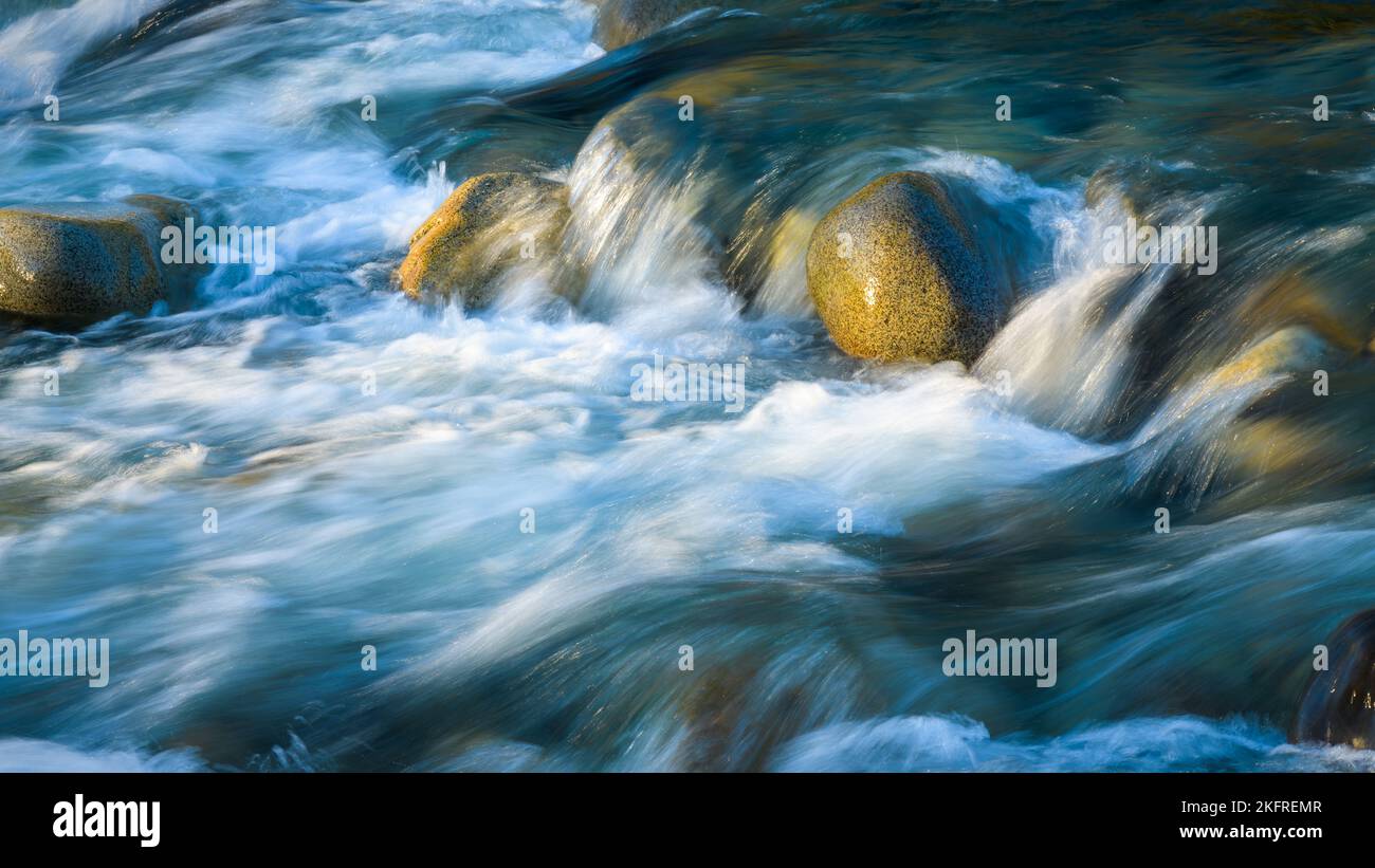 Water rushing over river rocks hi-res stock photography and images - Alamy
