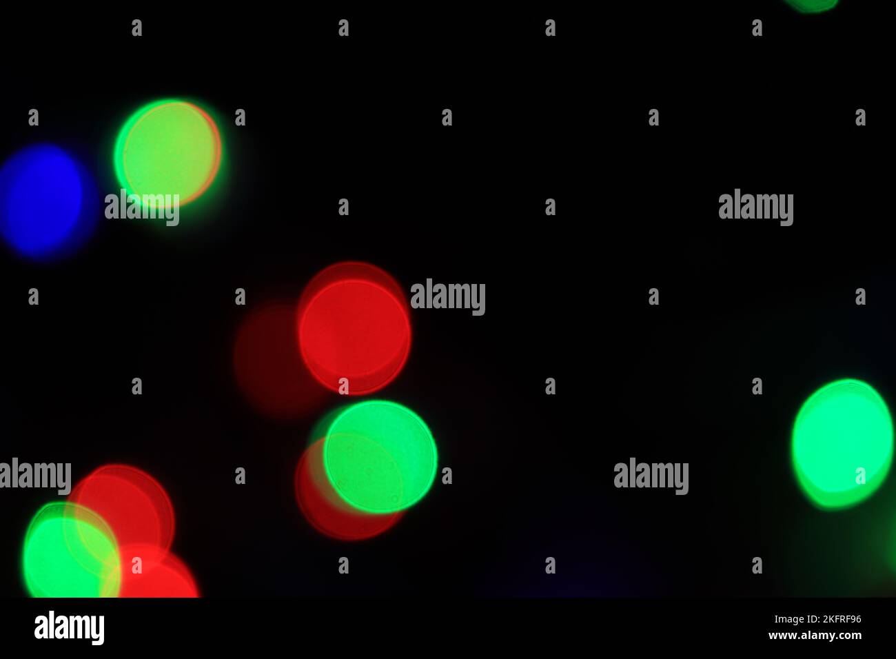 Christmas light on blurred black background Stock Photo