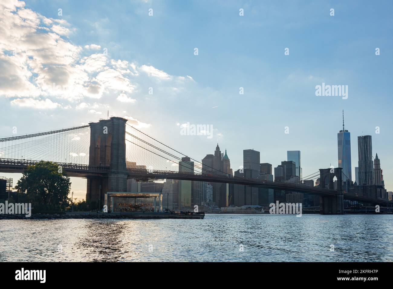 Sunset of the Brooklyn Bridge and New York City skyline at New York ...
