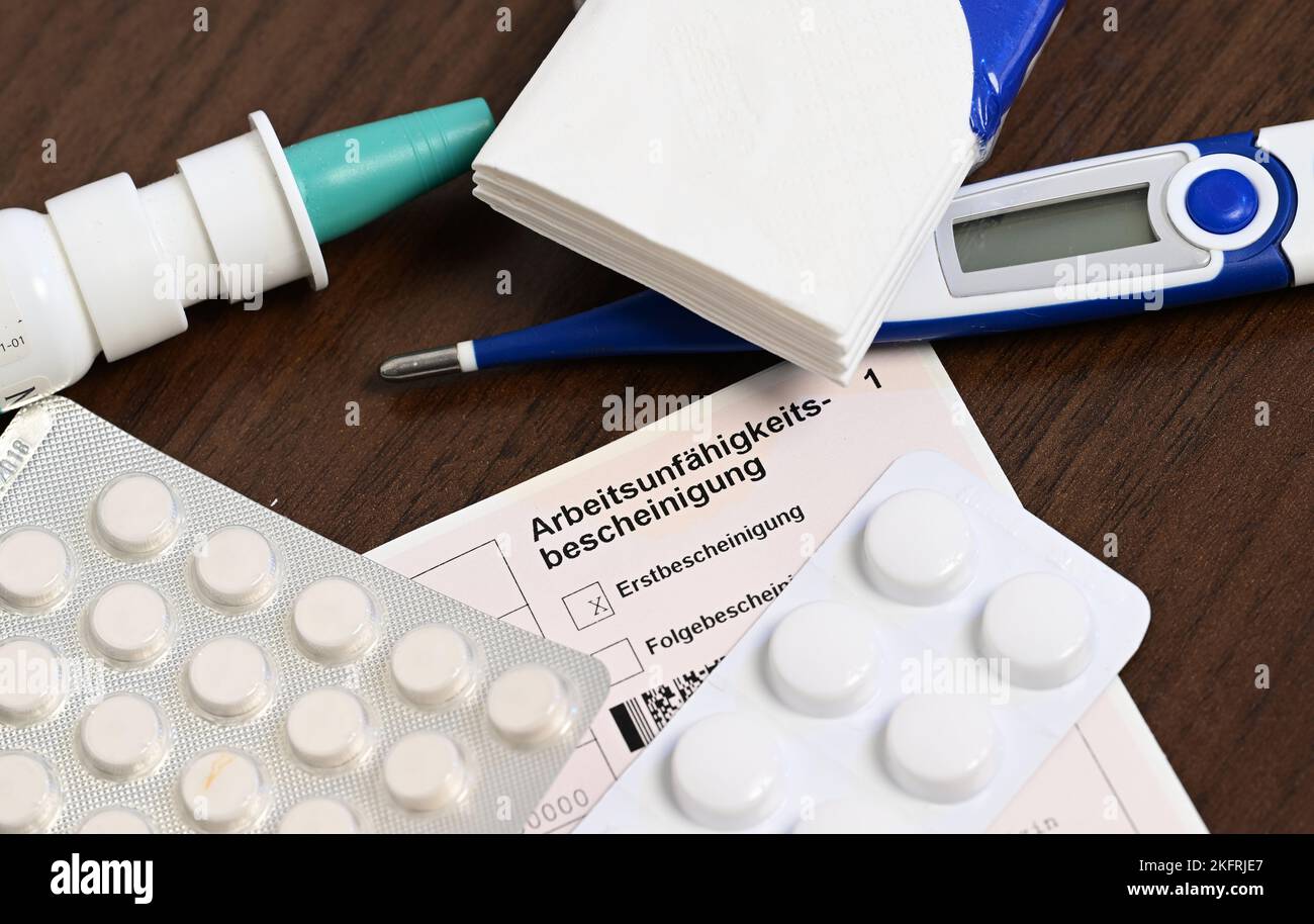 Stuttgart, Germany. 18th Nov, 2022. A fever thermometer, medication and