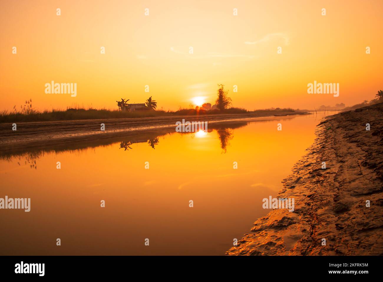 Beautiful Golden hour Sunrise landscape view near the Padma river in Bangladesh Stock Photo