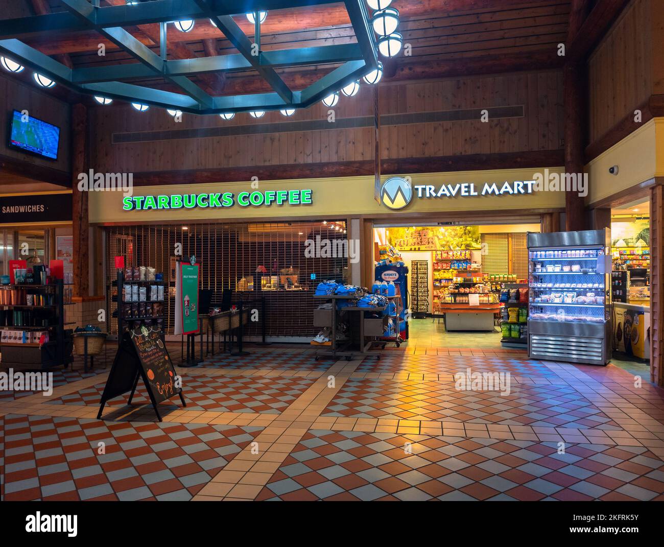 Pattersonville, New York - Nov 12, 2022: Landscape View of Starbucks Coffee and Travel Mart inside Pattersonville Travel Plaza. Stock Photo