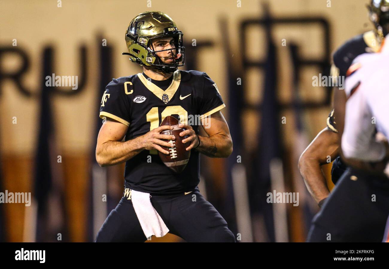 November 19, 2022: Wake Forest junior Sam Hartman (10) looks for open