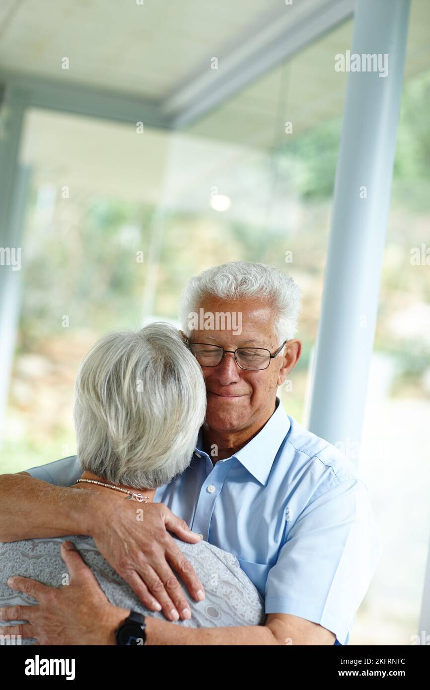 We all need a shoulder to cry on. a senior man consoling his wife. Stock Photo