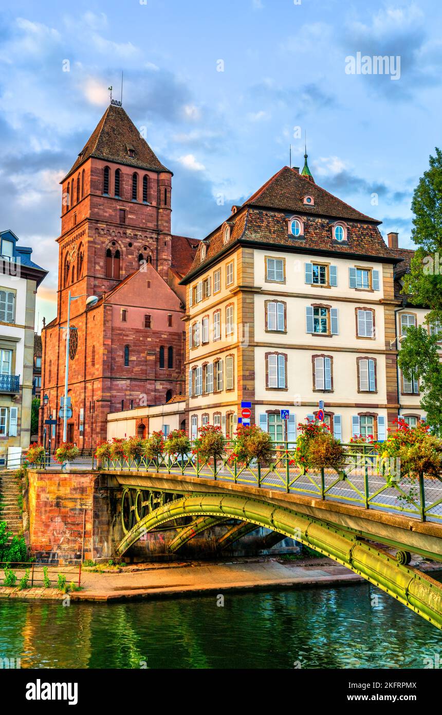 Saint Thomas church and bridge across the Ill in Strasbourg, France Stock Photo