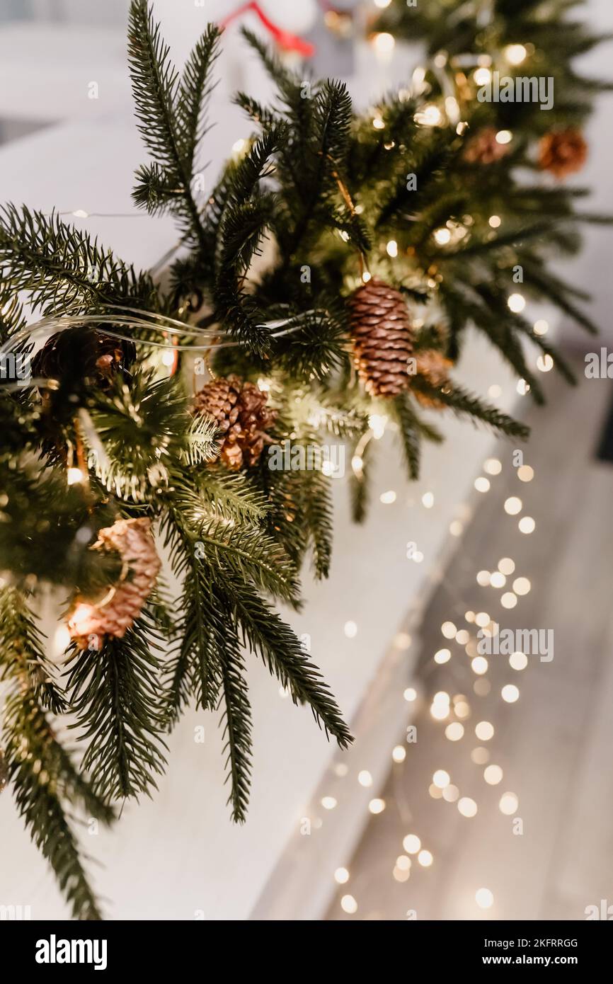 Christmas decorations on the holiday tree. Festive traditional seamless background for the New Year 2022-2023. Stock Photo
