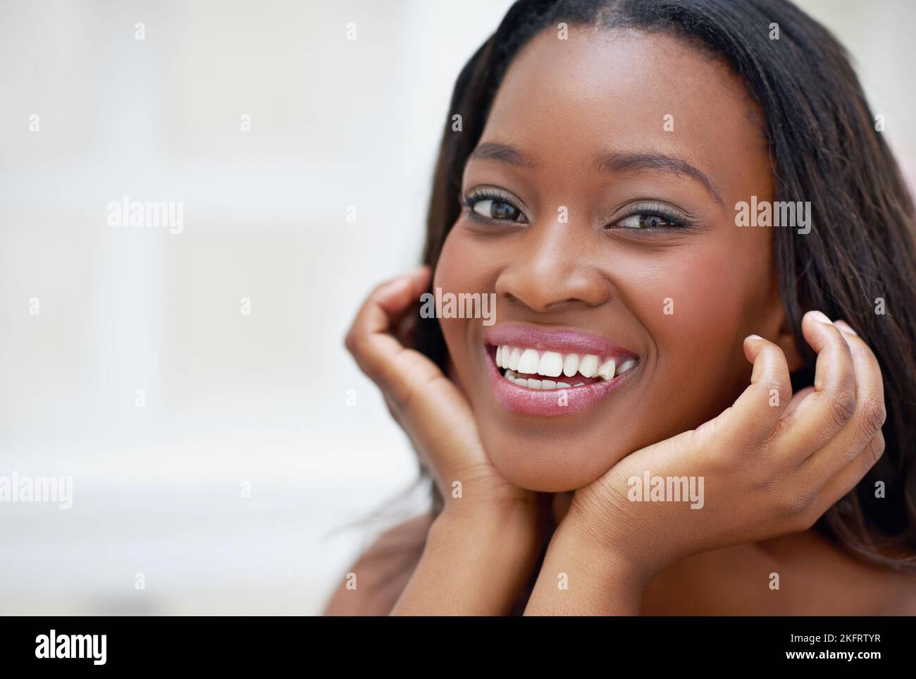Flawless and radiant. A young woman during her daily beauty ritual. Stock Photo