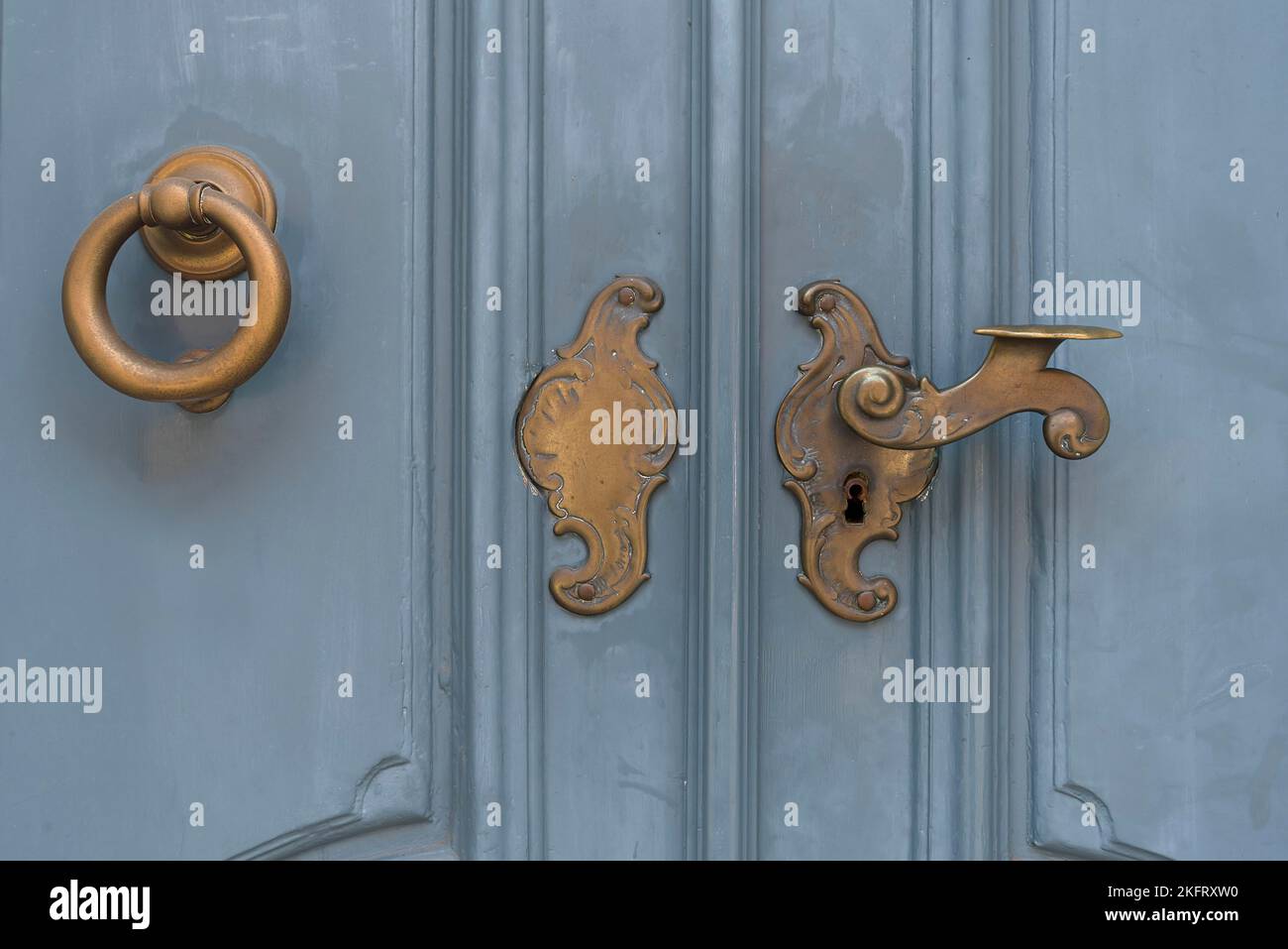 Historic brass door lock and knocker, Lüneburg, Lower Saxony, Germany, Europe Stock Photo