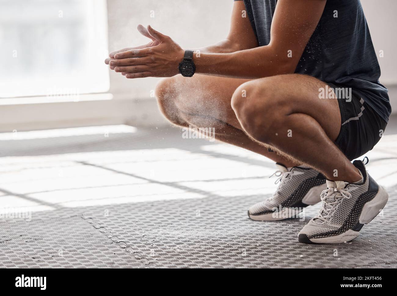 Man, powder and hands in gym for fitness, wellness or weightlifting