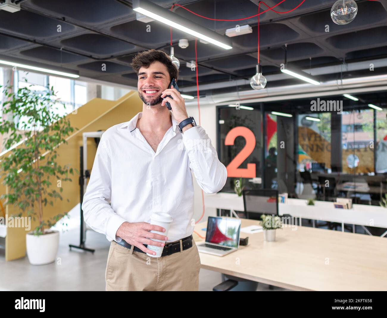 Bearded happy man works hi-res stock photography and images - Alamy