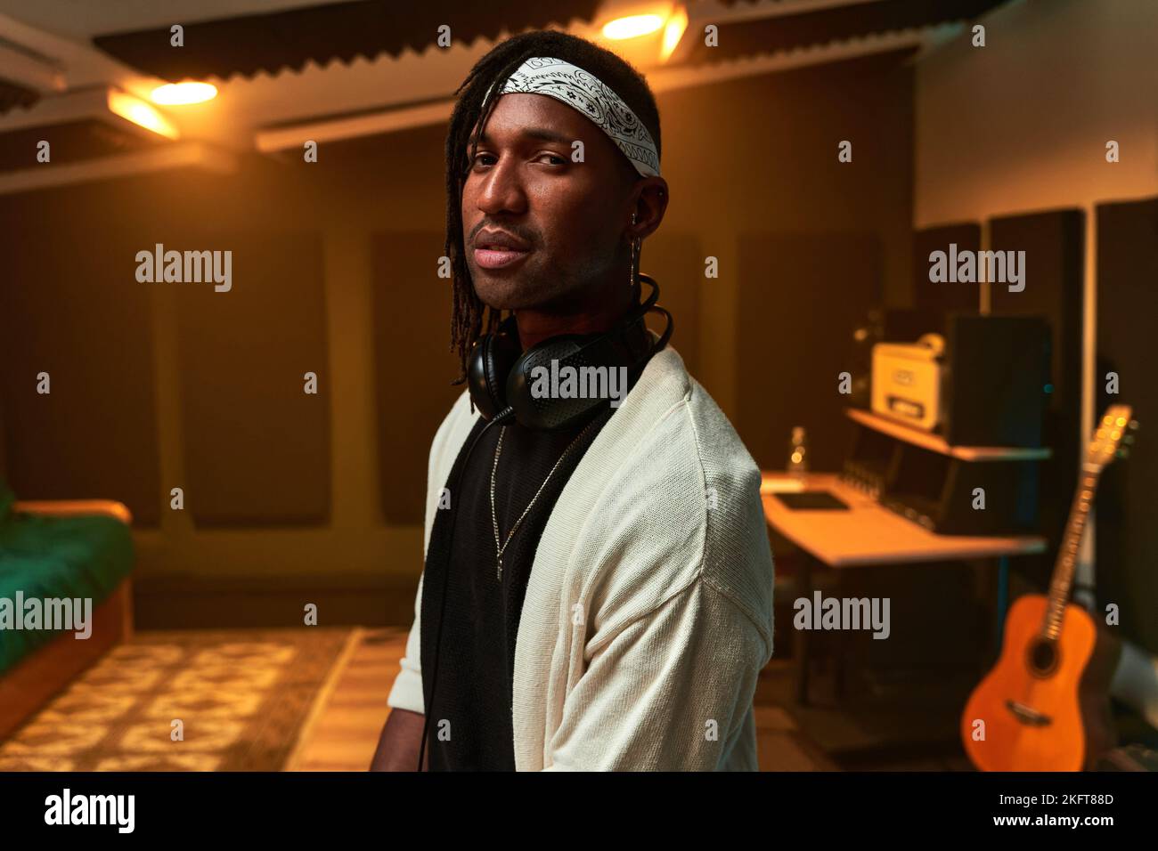 Portrait of African American male with dreadlocks bandana and black ...