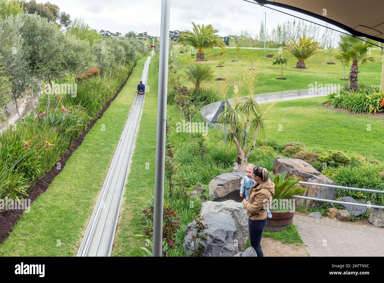 Bellville, South Africa - Sep 17, 2022: Tobogganing at Cool Runnings in Bellville in the Western Cape Province. People are visible Stock Photo