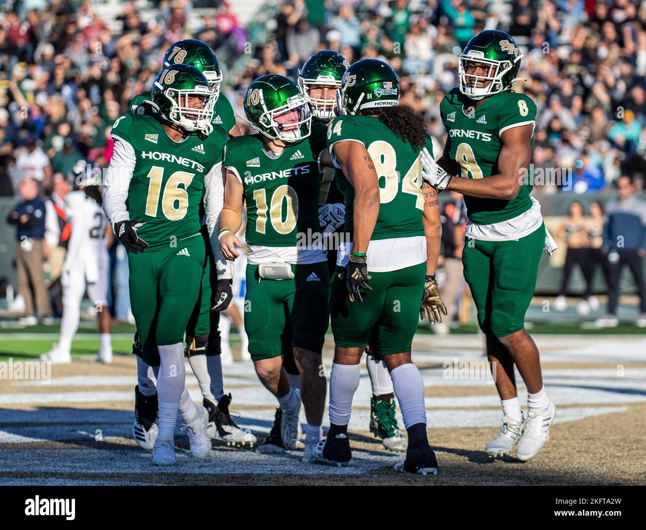 Hornet Stadium. 19th Nov, 2022. U.S.A. Sacramento State quarterback Asher O'Hara (10) and teammates celebrate his touch down during the NCAA Causeway Classic Football game between UC Davis Aggies and the Sacramento State Hornets. Sacramento State beat UC Davis 27-21 at Hornet Stadium. Thurman James/CSM/Alamy Live News Stock Photo