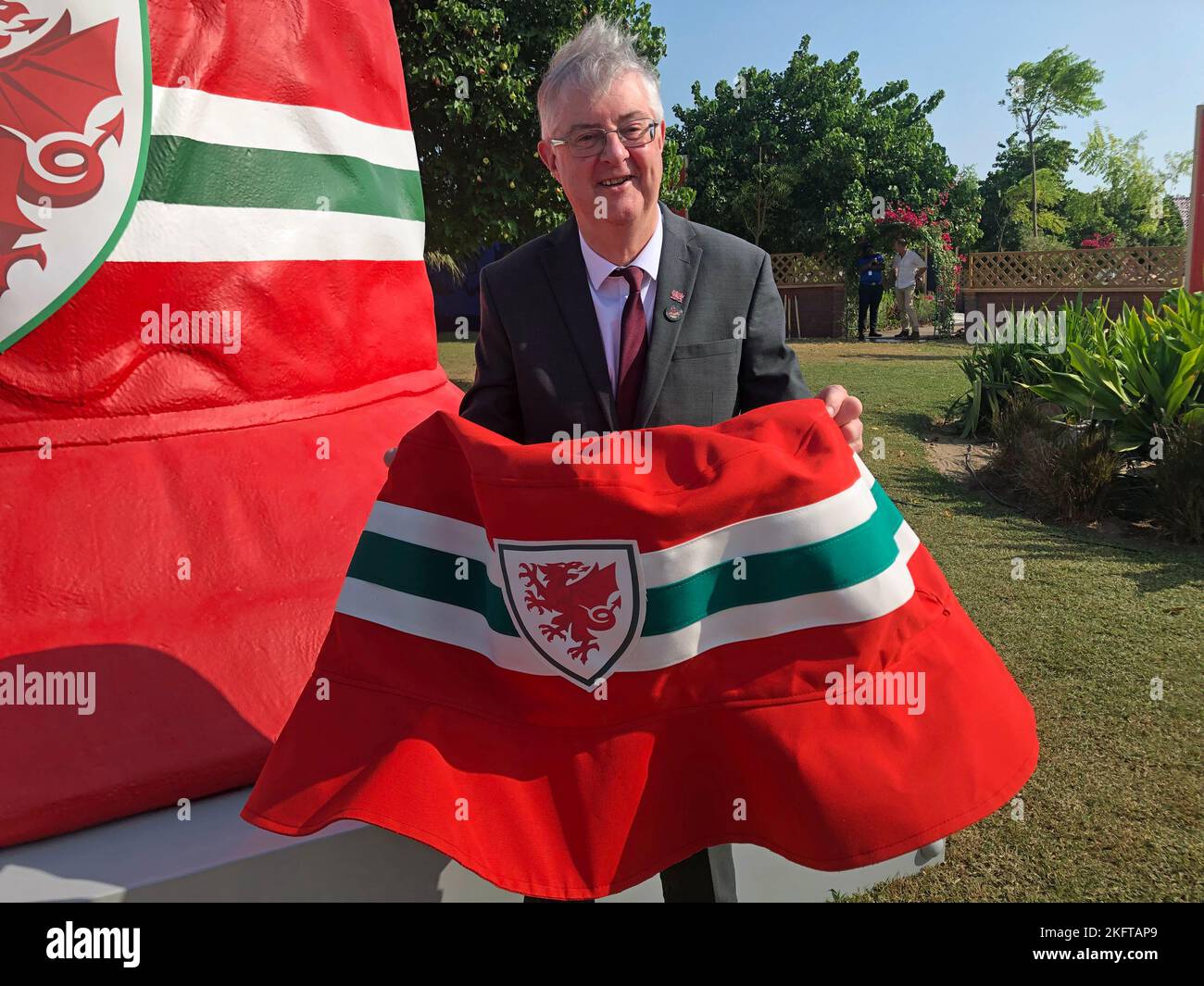 Wales First Minister Mark Drakeford in front of the giant bucket hat on