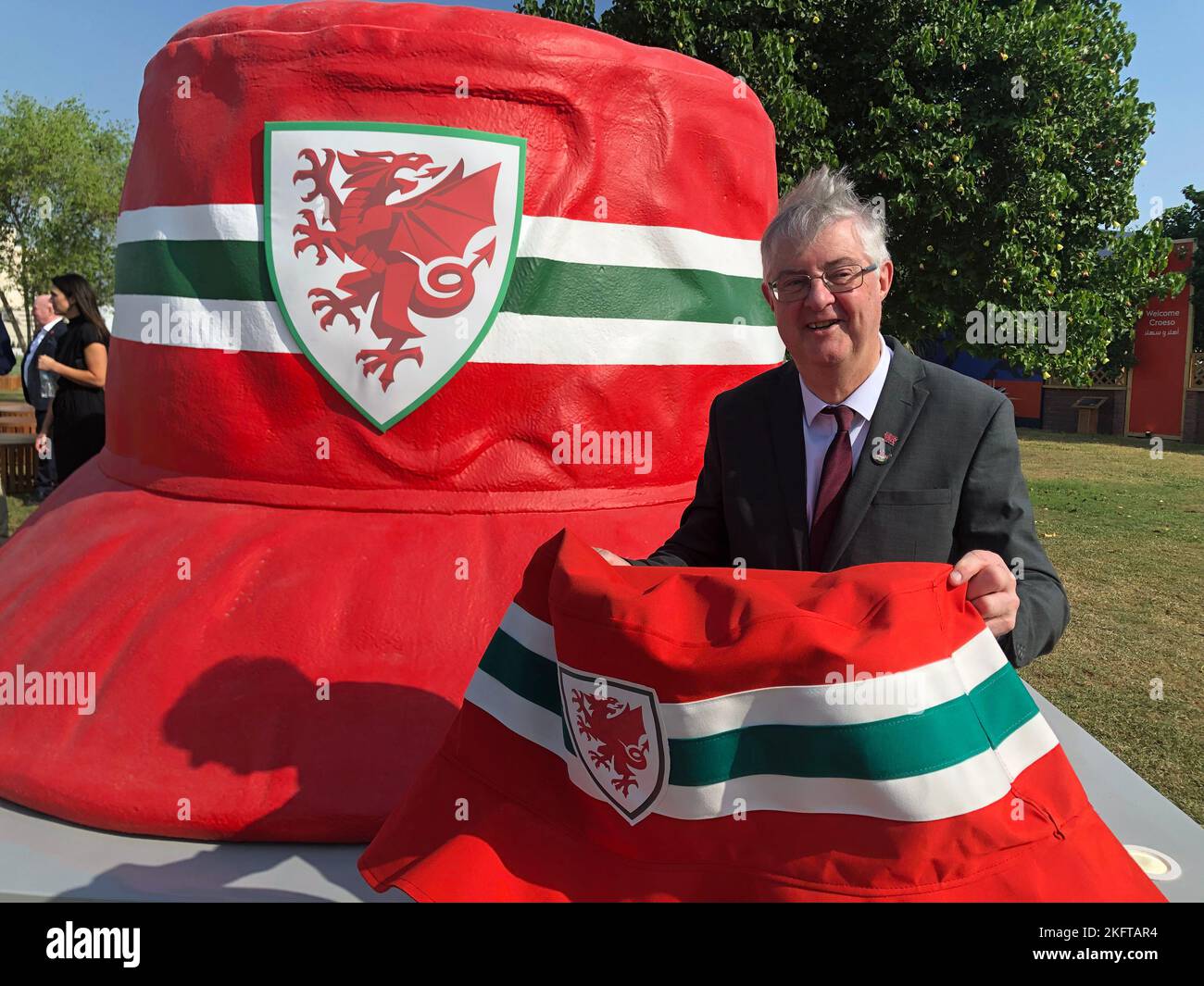 Wales First Minister Mark Drakeford in front of the giant bucket hat on