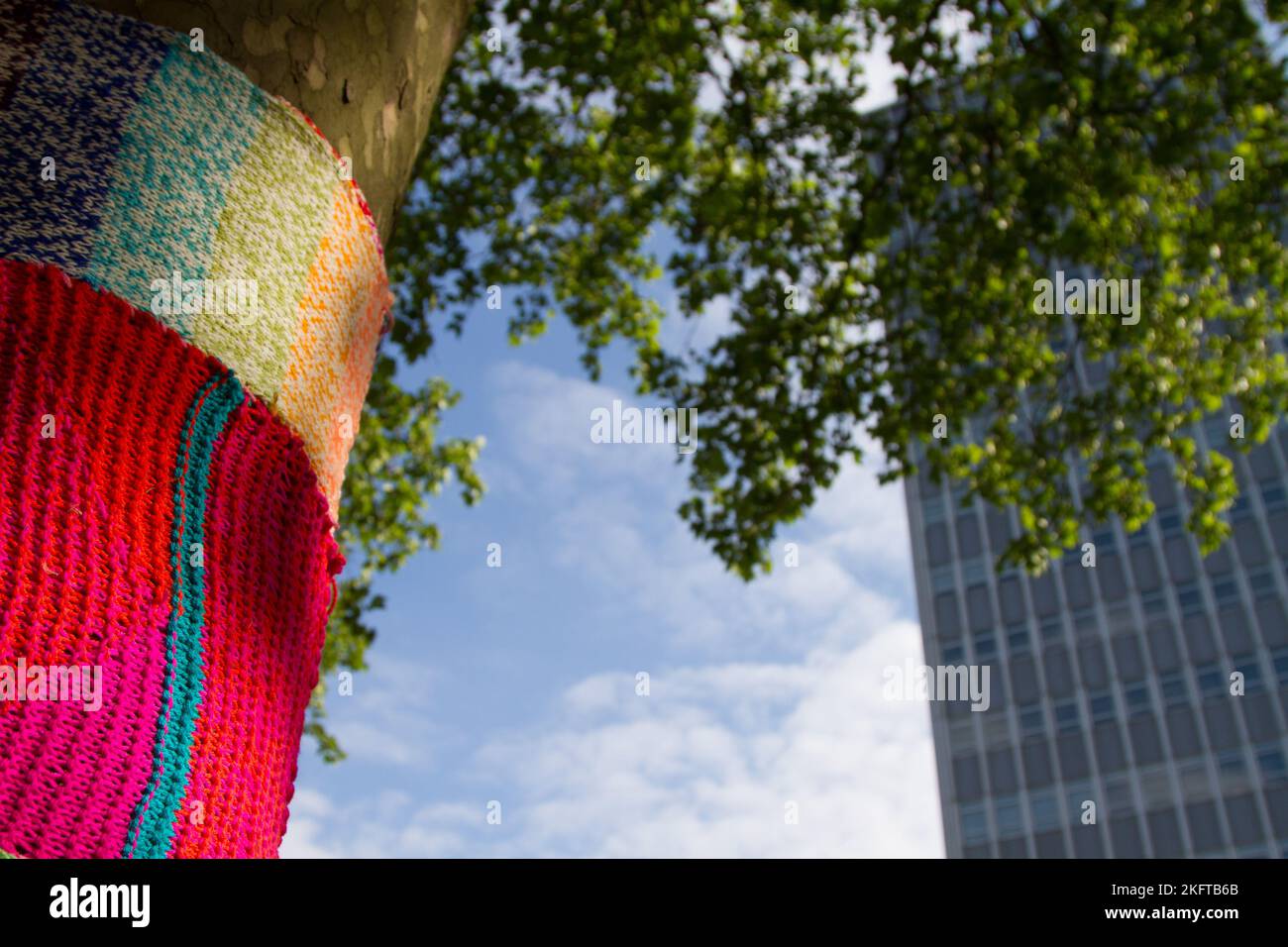 Colorful Crochet Knit on Tree Trunk in Kyiv, Ukraine. Street Art Goes by  Different Names, Graffiti Knitting, Yarn Bombing. Stock Image - Image of  urban, european: 291467773