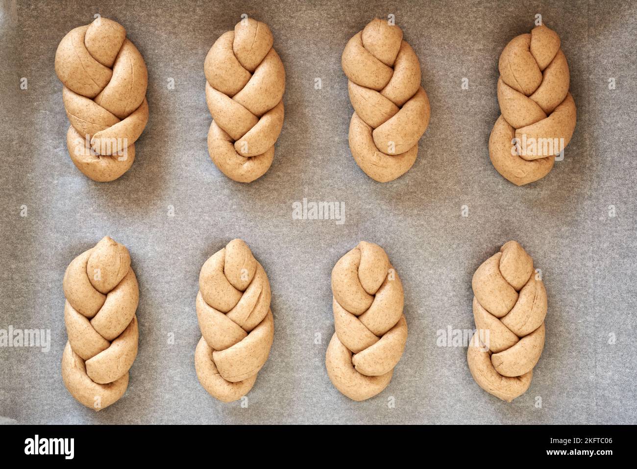 Preparation of braided bread rolls from whole grain spelt flour raw