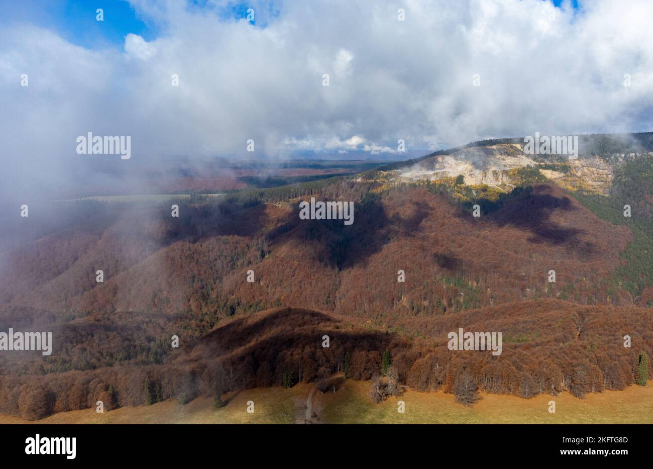 Fluffy clouds above valley hi-res stock photography and images - Alamy