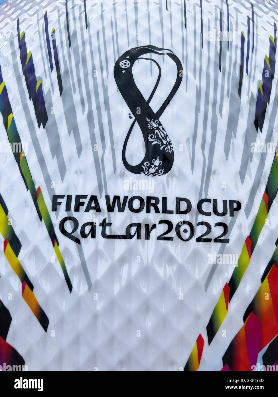 Giant size of FIFA World Cup Qatar 2022 official football on display in public area. The ball is name 'Al Rihla', meaning The Journey in Arabic. Stock Photo