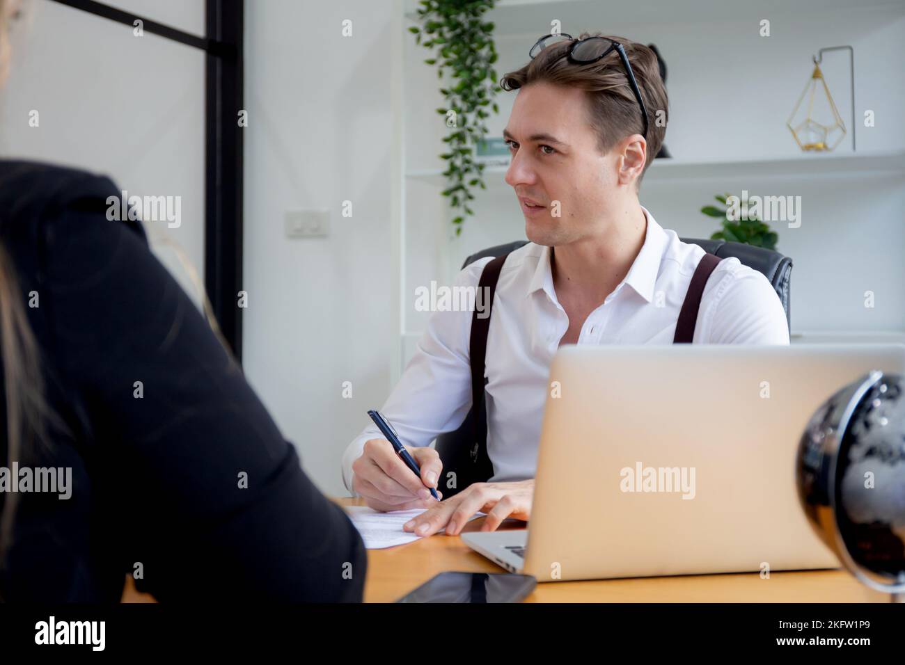 Young caucasian business woman sitting and job interview with manager at office, hr director talking and interview with recruitment personnel and cont Stock Photo