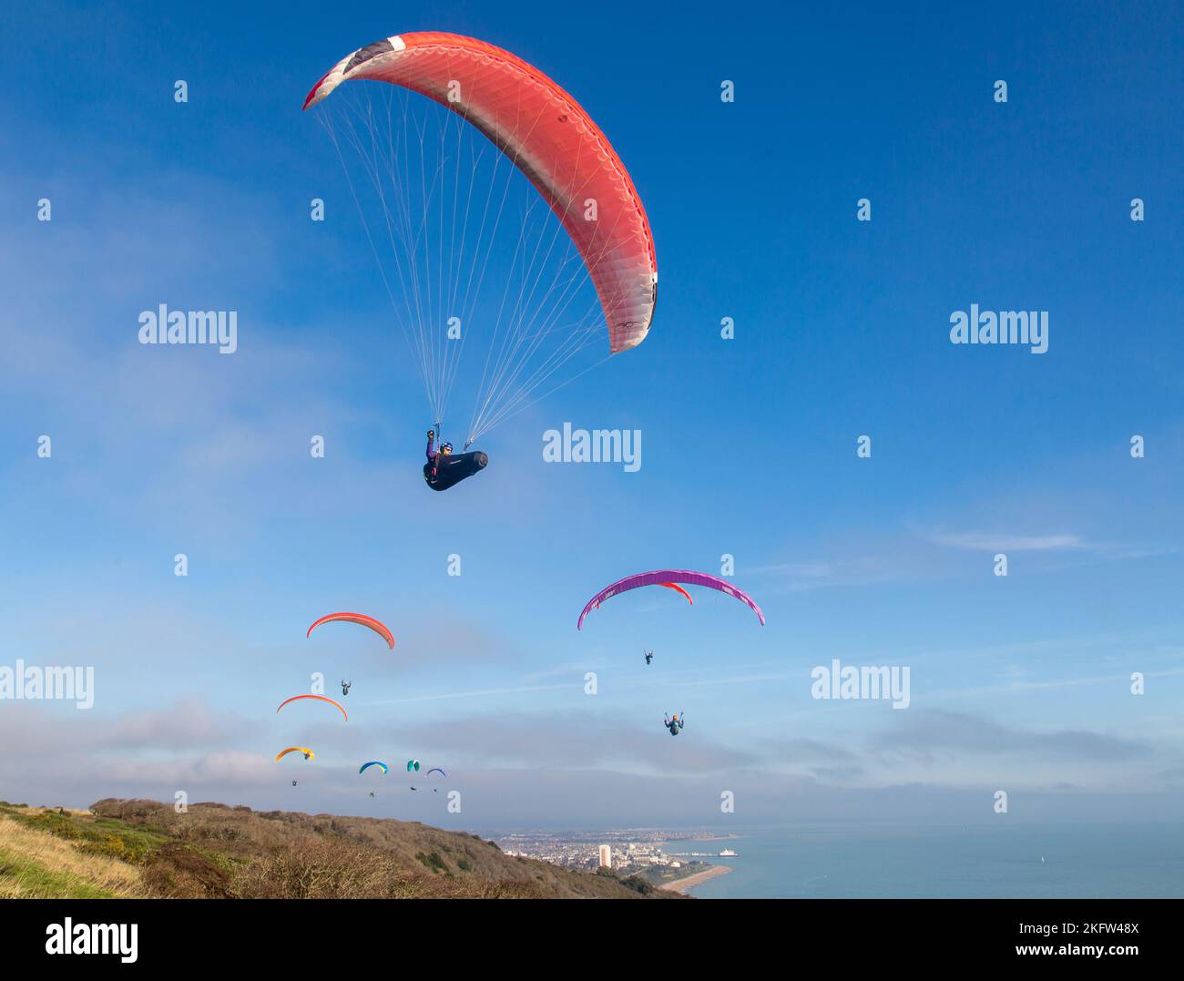 Paragliders at Beachy Head, Eastbourne, East Sussex UK Stock Photo