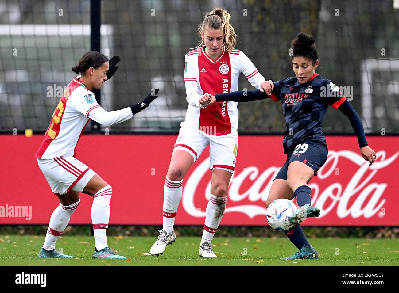 AMSTERDAM - (lr) Quinty Sabajo of Ajax women, Lisa Doorn of Ajax women, Chimera Ripa of PSV V1 during the Dutch Eredivisie women's match between Ajax and PSV at sports complex De Toekomst on November 20, 2022 in Amsterdam, Netherlands. AP | Dutch Height | Gerrit van Cologne Stock Photo