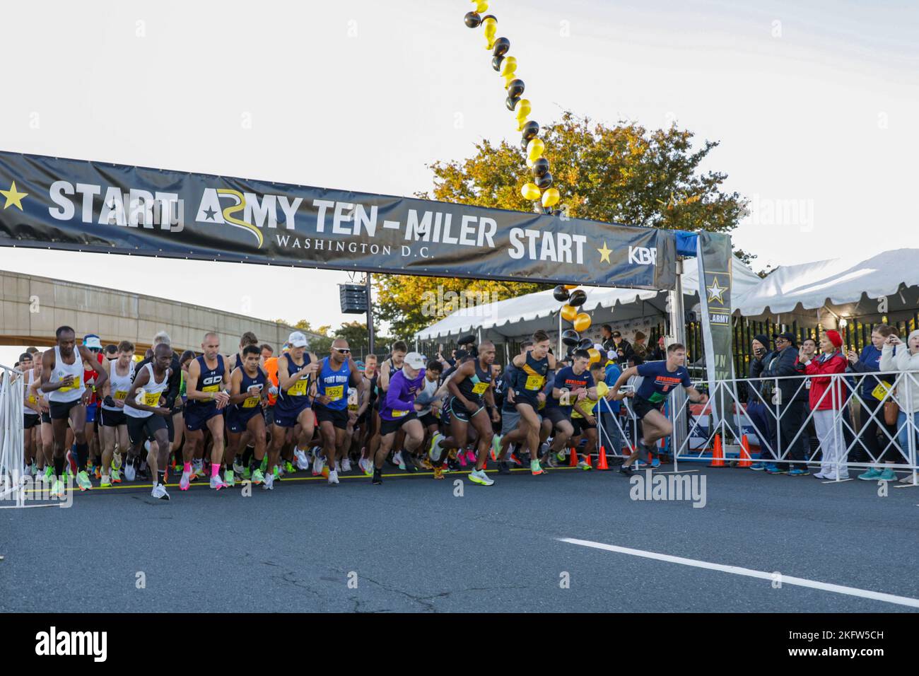 Runners cross the start line during the Army 10Miler race Oct. 9, 2022