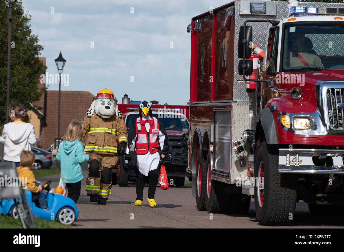 “Sparky”, The mascot of the RAF Lakenheath Fire Department, walks with