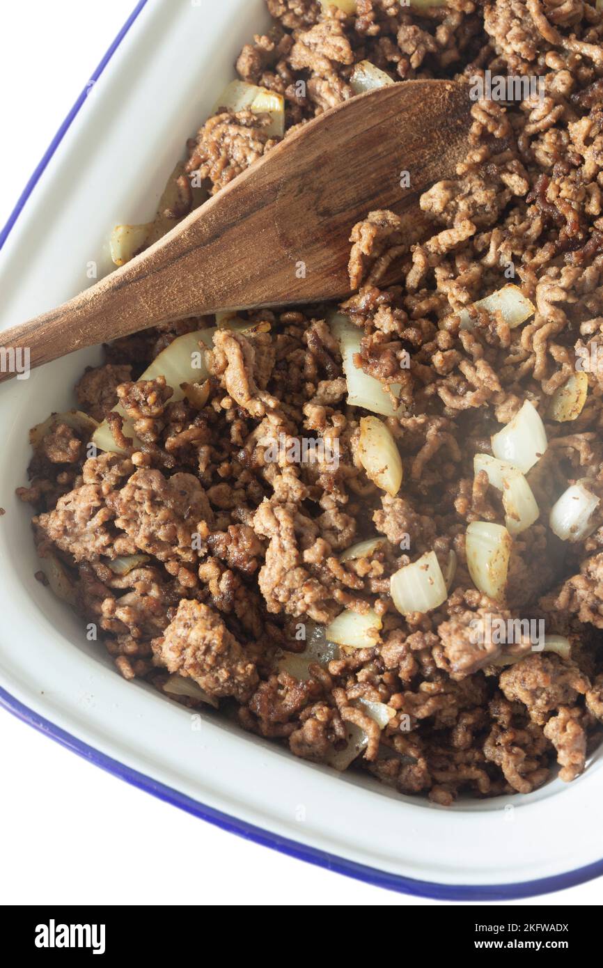 Minced beef with onion in a traditional enamel dish. Stock Photo