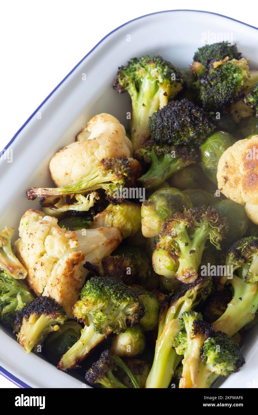 Brussels sprouts, cauliflower and broccoli, oven roasted in olive oil