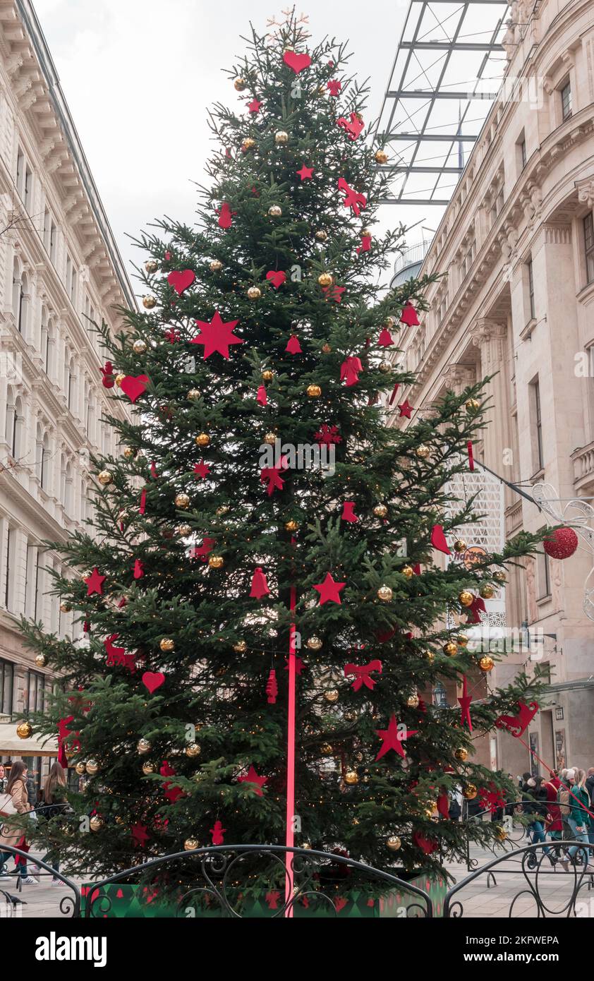 Christmas tree with red ornaments at the local Christmas market in