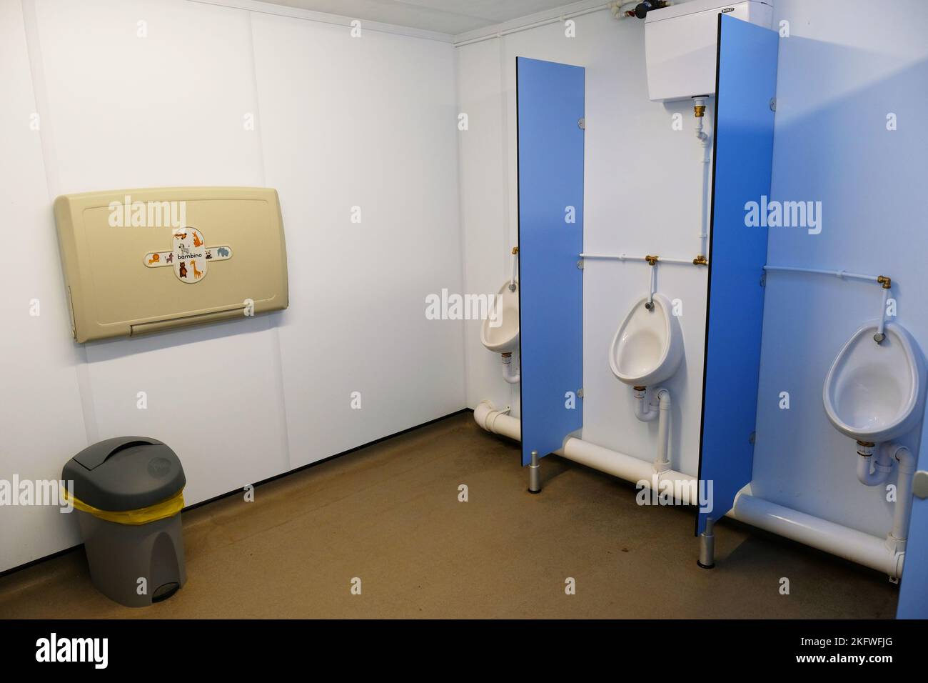 Interior of a mens public toilet - John Gollop Stock Photo