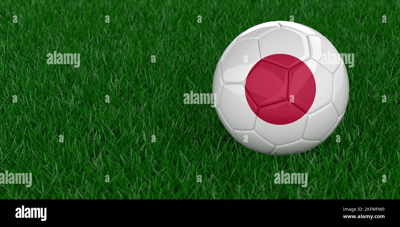 Japan National football with country flag pattern. Soccer tournament concept. Sports betting. Realistic 3D rendered grass background, copy space. Stock Photo