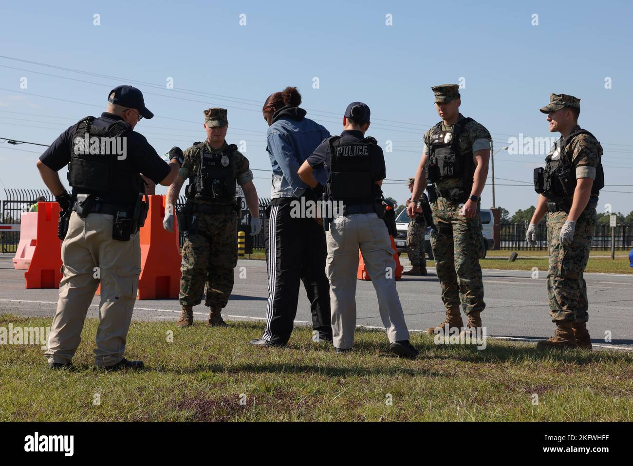 Marine Corps Air Station (MCAS) Cherry Point military police, detain a