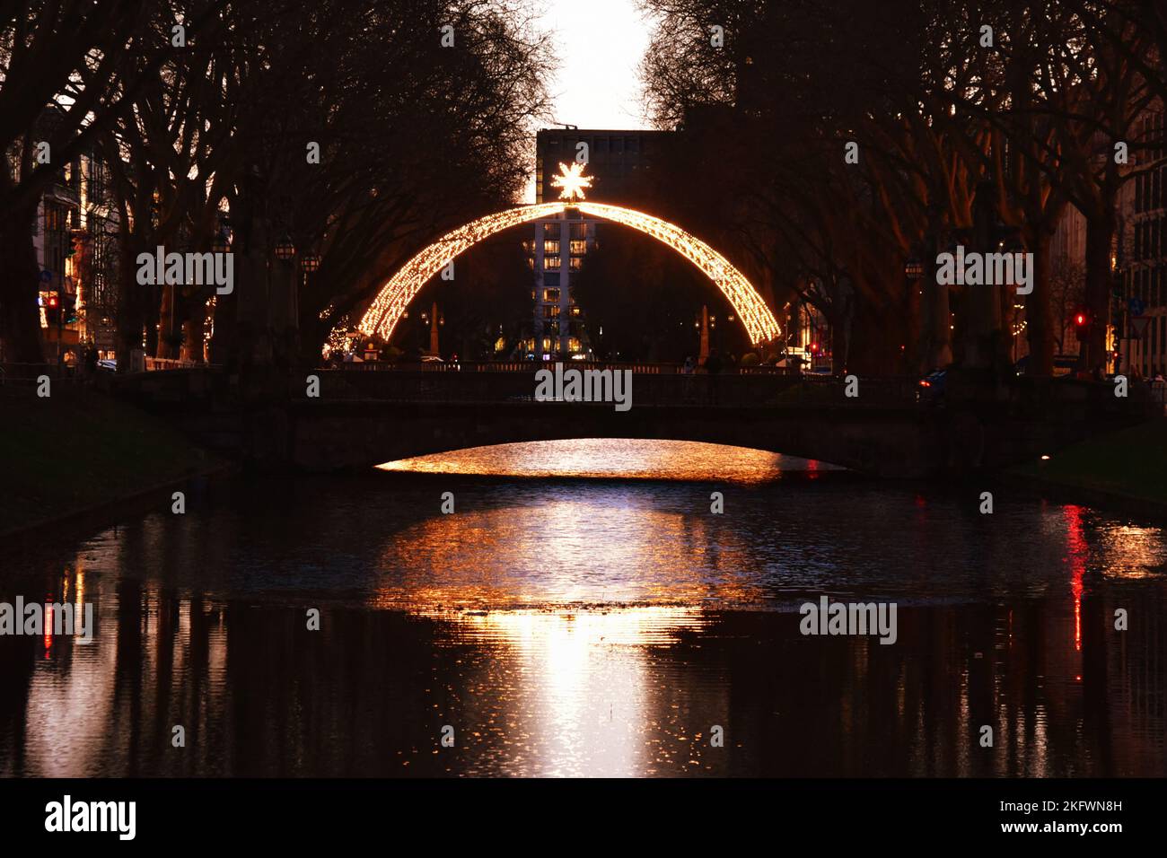 Traditional Christmas Arc at Königsallee in Düsseldorf. It is similar to the Christmas illumination the city used to have in the 1950s. Stock Photo